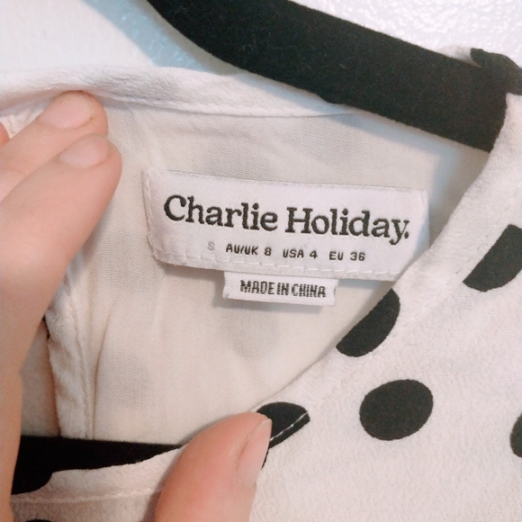 Charlie Holiday the Holiday top features puff sleeves, a round neckline, drawstr - Picture 6 of 6